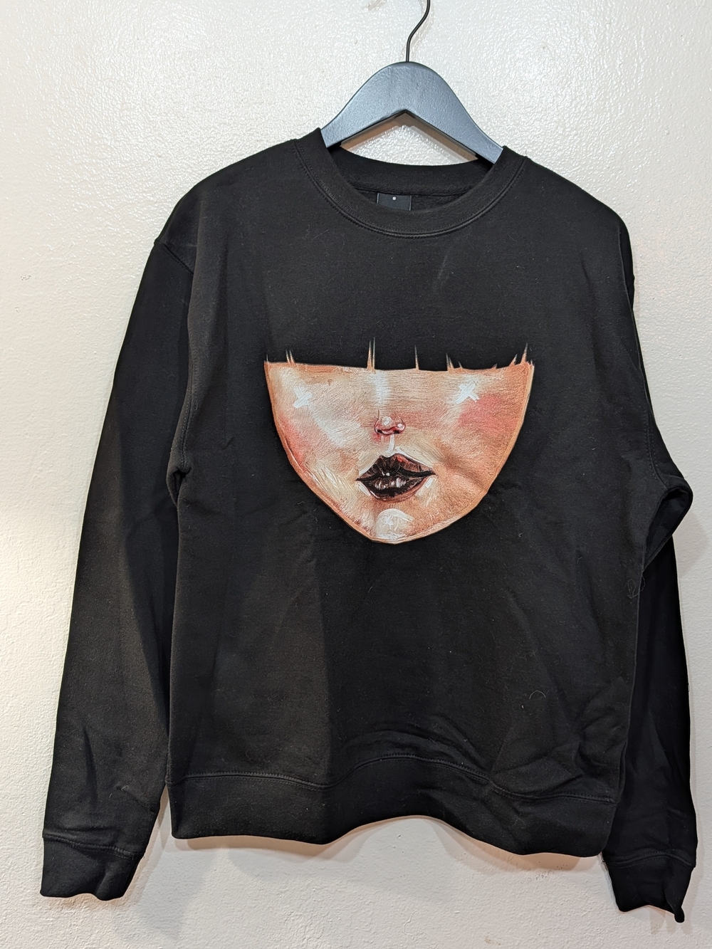 Black Graphic Crewneck Sweatshirt with Artistic Face Print